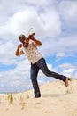 Musician with violin playing on the beach Royalty Free Stock Photo