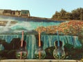 Violins in the street and painted wall