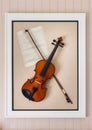 Violon with fiddlestick decoration Royalty Free Stock Photo