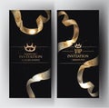 Elegant invitation cards with golden textured ribbons.