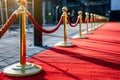 Concept Event VIP treatment at events Red carpet surrounded by golden barriers and ropes