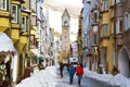 VIPITENO, ITALY - JANUARY 23, 2018: ZwÃÂ¶lferturm tower and people in main street of the old medieval town of Vipiteno