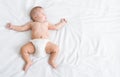 Newborn baby with measles rash sleeping on bed Royalty Free Stock Photo