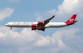 Virgin Atlantic Airbus A340-600 G-VRED passenger plane landing at London Heathrow Airport Royalty Free Stock Photo