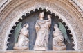 Virgin and Child with two Angels, Portal on the side-wall of Florence Cathedral Royalty Free Stock Photo