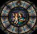 Virgin Mary with baby Jesus, stained glass window in the Cathedral of Saint Lawrence in Lugano