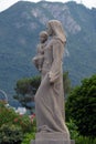 Virgin Mary with baby Jesus statue in front of the Cathedral of Saint Lawrence in Lugano Royalty Free Stock Photo