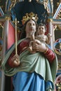 Virgin Mary with baby Jesus statue on the main altar in the church Birth of the Virgin Mary in Granesina, Croatia
