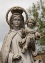 Virgin Mary and Child Jesus in a cemetery Royalty Free Stock Photo