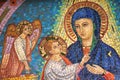 Virgin Mary, the child Jesus and one angel Royalty Free Stock Photo