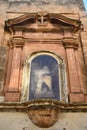 Virgin Mary with Child on a wall of an old house in Mellieha