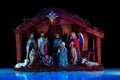 Virgin Mary, Joseph and baby Jesus. Religious scene. Christmas Manger scene with figures of Jesus, Mary, Joseph, sheep Royalty Free Stock Photo