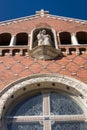 Virgin Mary statue on church facade Royalty Free Stock Photo