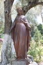 Virgin Mary statue, Ephesus, SelÃÂ§uk, Izmir, Turkey. House of the Virgin Mary garden Royalty Free Stock Photo