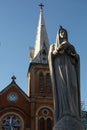 The Virgin Mary statue and exterior of Saigon Notre Dame Cathedral Basilica in Ho Chi Minh city, Vietnam. Asia Royalty Free Stock Photo