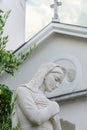 Virgin Mary statue in front of the Church of the Assumption of the Blessed Virgin Mary