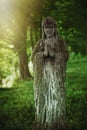 Virgin Mary statue. Very old and ancient stone statue of sad woman in grief Royalty Free Stock Photo