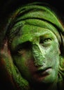 Virgin Mary. Very ancient stone statue of sad woman Royalty Free Stock Photo