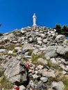 Virgin statue Notre Dame de Neige at Col de Bavella, Corsica, France. Vertical.