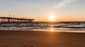 Virginia Beach Fishing Pier with Sun at Horizon Royalty Free Stock Photo