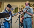 Virginia Carolina playing a Banjo and Mandolin