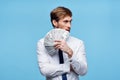 Virgo man in tie with money in hands wealth success self-confidence
