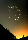 Virgo zodiac constellations sign with forest landscape silhouette on beautiful starry sky with galaxy and space behind Royalty Free Stock Photo