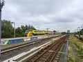 VIRM doubledeck intercity train along platform in Duivendrecht