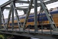 VIRM doubledecks intercity train along the rail bridge at Kethel in schiedam Royalty Free Stock Photo