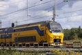 VIRM intercity train on track of NS between The Hague and Delft