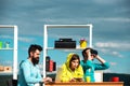 Virtual business. Modern technology. Young men and women sitting at a table with virtual reality goggles. Business team Royalty Free Stock Photo