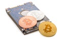 virtual coins bitcoin lie on hard drive isolated on white background, mining concept Royalty Free Stock Photo