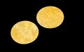 Bitcoin (BTC) obverse and reverse, cryptocurrency, gold coin black background. Blockchain payment system.