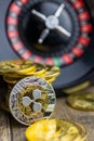 Virtual money Ripple XRP cryptocurrency - risky invenstment with the Ripples currency - gold coin with a roulette as a symbol of Royalty Free Stock Photo
