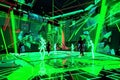 Virtual Reality Bar with Chaotic Green Neon Light Geometric Traces and Dancing Silhouettes, Generative AI