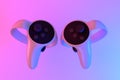 Virtual reality controllers for online and home gaming in neon lights on white
