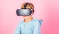 Virtual reality future technology. Discover virtual reality. Kid boy wear vr glasses pink background. Child boy play