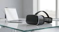 Modern Workspace: Laptop and VR Headset on Glass Desk Royalty Free Stock Photo