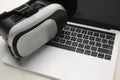 Virtual Reality Headset and Laptop on White Background Royalty Free Stock Photo