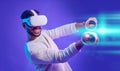 Virtual reality headset, metaverse and man fight for futuristic gaming, cyber and 3d world. Gamer person with hand for