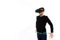 Nice and modern bearded young man with vr glasses enjoying virtual reality