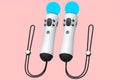 Virtual reality white controllers for online and cloud gaming on pink Royalty Free Stock Photo