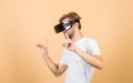Virtual simulation. Man play game in VR glasses. Augmented 3D world. Explore cyber space. Man hipster virtual reality