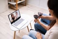 Virtual Wine Tasting Using Laptop. Online Party Royalty Free Stock Photo