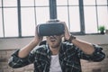 Exited man using a new VR headset