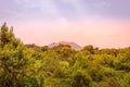 Virunga Volcanoes and Mgahinga Gorilla National Park from Kisoro in colorful early morning with mist in the valley. Kisoro Distric