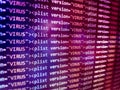 Virus detected, alert message. Scanning and identifying computer virus inside binary code listing Royalty Free Stock Photo