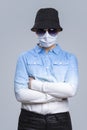 Virus Ideas. Concept of Coronavirus of Depressed Caucasian Woman In Glasses And Black Hat Wearing Flu Virus Mask For Viral Royalty Free Stock Photo