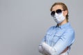 Virus Ideas. Concept of Coronavirus of Depressed Caucasian Woman In Glasses Wearing Flu Virus Mask For Viral Prevention. Against Royalty Free Stock Photo