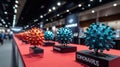 Virus models displayed on a red carpet at a convention Royalty Free Stock Photo
